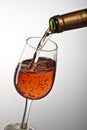 Pouring a glass of ros wine Royalty Free Stock Photo