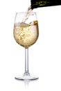 Pouring a glass of white wine isolated on white Royalty Free Stock Photo