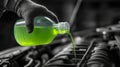 Pouring Green Coolant into Car Engine System Royalty Free Stock Photo