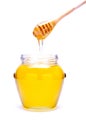 Pouring honey Royalty Free Stock Photo