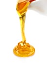 Pouring honey Royalty Free Stock Photo