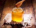 Pouring honey into jar