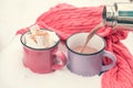 Pouring hot chocolate in the cup Royalty Free Stock Photo