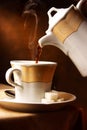 Hot coffee pouring in a cup Royalty Free Stock Photo