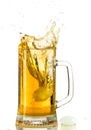 Pouring light beer in a beer mug, it turns out foam and spray Royalty Free Stock Photo