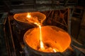 Pouring liquid metal from arc furnace Royalty Free Stock Photo