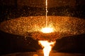 Pouring liquid metal from arc furnace Royalty Free Stock Photo