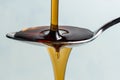 Pouring Maple Syrup on a Spoon Royalty Free Stock Photo