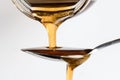 Pouring Maple Syrup on a Spoon Royalty Free Stock Photo