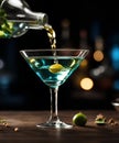 Pouring Martini into the glass on dark background. Commercial promotional photo Royalty Free Stock Photo