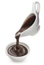 Pouring melted chocolate isolated on white background Royalty Free Stock Photo
