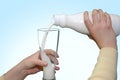 Pouring milk in the glass Royalty Free Stock Photo