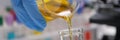 Pouring and mixing chemicals closeup. Laboratory and scientific experiments Royalty Free Stock Photo