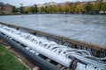 Pouring of modern engineering system hoses for skating rink cooling. Preparation for winter activity