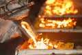 Pouring molten metal to casting mold Royalty Free Stock Photo