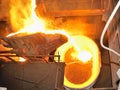 Pouring molten steel in transportation device Royalty Free Stock Photo