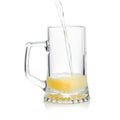 pouring a mug with fresh draft beer, isolated on white Royalty Free Stock Photo