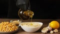 Enjoying yummy hummus with pita, lavash, bread sticks, grissini. Kosher healthy vegan food. Lean dish Royalty Free Stock Photo