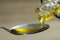 Pouring olive oil Royalty Free Stock Photo