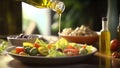 Pouring olive oil from a flask into a exuberant mediterranean salad. International Cuisine