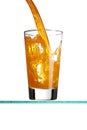 Pouring an orange beverage Royalty Free Stock Photo