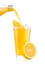 Pouring orange soda drink from bottle to glass Royalty Free Stock Photo