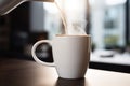 Pouring organic natural tasty healthy tea streaming in white cup mug of hot aroma steam smoke coffee on table morning Royalty Free Stock Photo