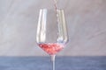 Pouring Pink Rose Blush Wine to Glass Royalty Free Stock Photo