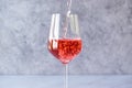 Pouring Pink Rose Blush Wine to Glass