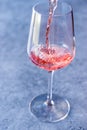 Pouring Pink Rose Blush Wine to Glass Royalty Free Stock Photo