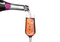 Pouring pink rose champagne from bottle to glass Royalty Free Stock Photo