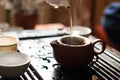 Pouring of Puer Tea from Teapot at Traditional Chinese Tea Ceremony. Set of Equipment for Drinking Tea