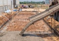 Pouring ready-mixed concrete after placing steel reinforcement Royalty Free Stock Photo