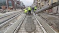 Pouring ready-mixed concrete after placing steel reinforcement to make the road by concrete mixer . Royalty Free Stock Photo