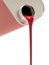 Pouring red paint from canister Royalty Free Stock Photo