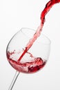 Pouring red wine into glass. Royalty Free Stock Photo
