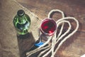 Pouring red wine glass against wooden background Royalty Free Stock Photo