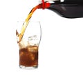 Pouring refreshing cola into glass with ice cubes on white Royalty Free Stock Photo