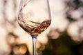 Pouring rose wine into a glass