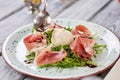 Pouring with sauce salad with burrata cheese. Royalty Free Stock Photo