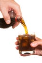 Pouring soda into a glass Royalty Free Stock Photo