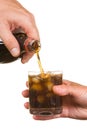 Pouring soda into a glass Royalty Free Stock Photo