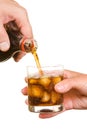 Pouring soda into a glass Royalty Free Stock Photo