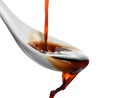 Pouring soy sauce into spoon Royalty Free Stock Photo