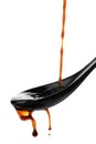 Pouring soy sauce into spoon Royalty Free Stock Photo
