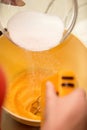 Pouring sugar into bowl Royalty Free Stock Photo