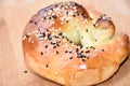 Bagels with seeds on a black background