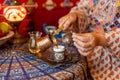 Pouring turkish coffee from cezve into cup Royalty Free Stock Photo