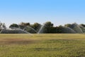 Pouring water of green lawn landscape.Wet grass photo Royalty Free Stock Photo