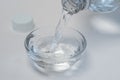 Pouring White Vinegar from a Bottle Royalty Free Stock Photo